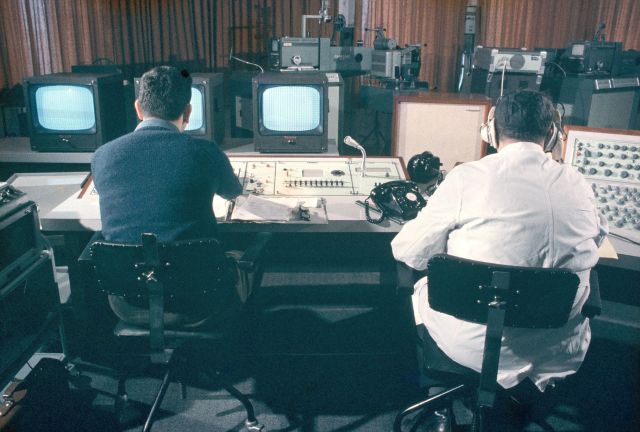 Meyer (left) working in the CCR, not sure who is sitting on the right